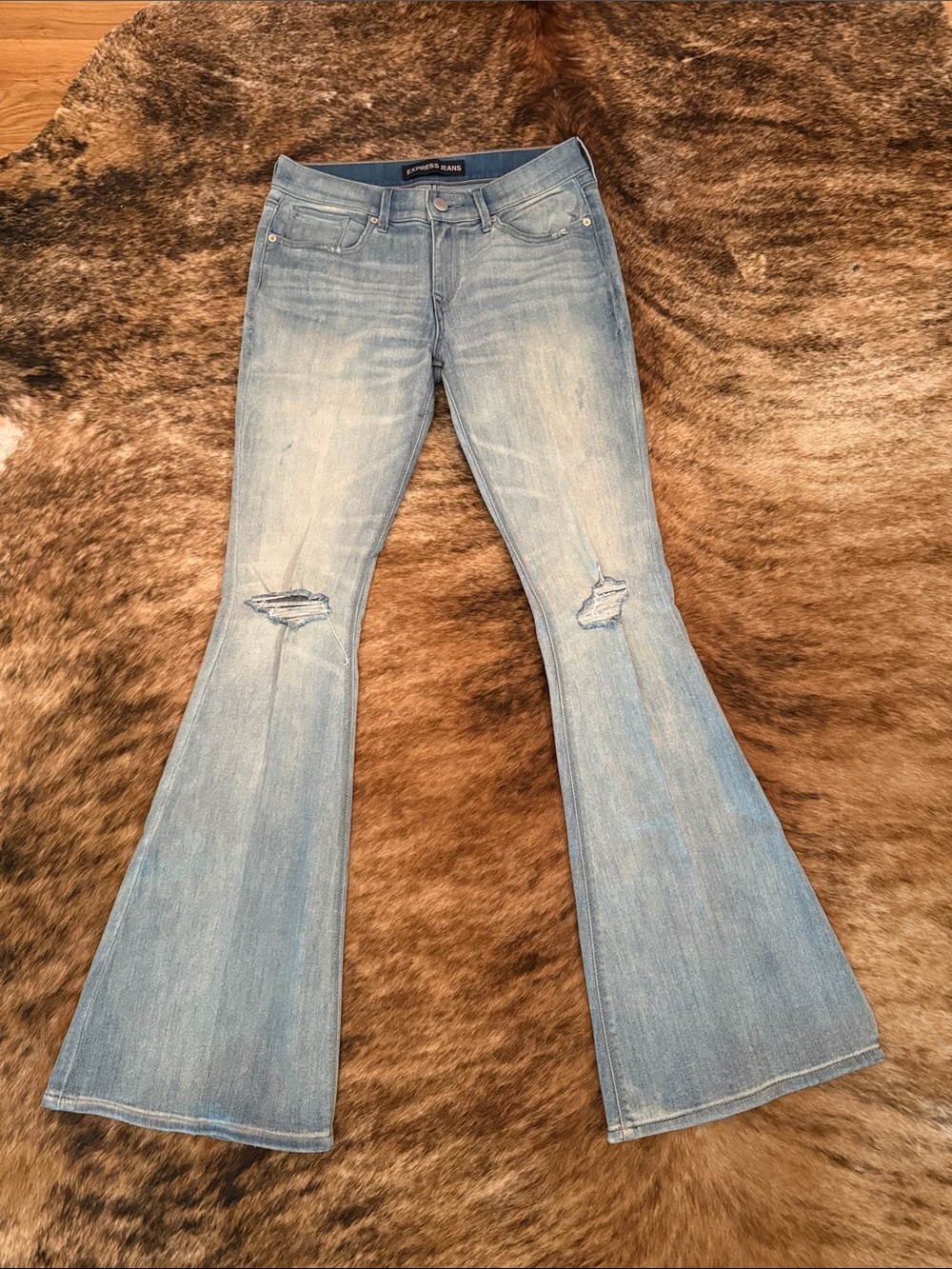 Express Light Blue Flared Jeans with Knee Rips - Women's